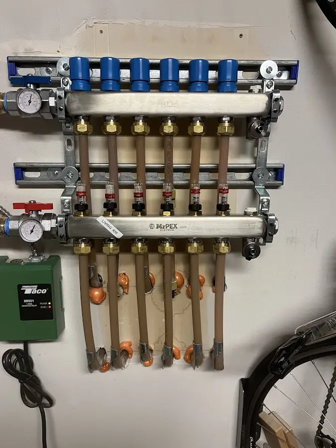 Plumber performing Water Heater Repair at a residential property in Newport News